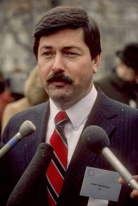 February 24, 1986 - Washington, District of Columbia, U.S - Governor Terry Branstad of Iowa talks with reporters on the North lawn of the White House, after meeting with President Ronald Reagan as part of the annual WInter meeting of the National Governors Assoication. Washington U.S. - ZUMAr142 19860224_zap_r142_001