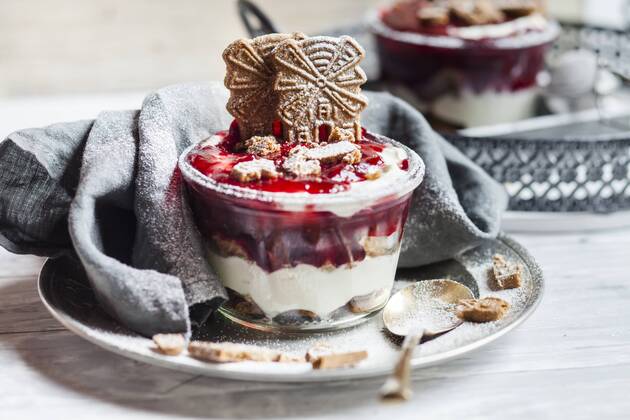 Glass of dessert of almond biscuits, Greek yoghurt and cranberry compote  SBDF03122
