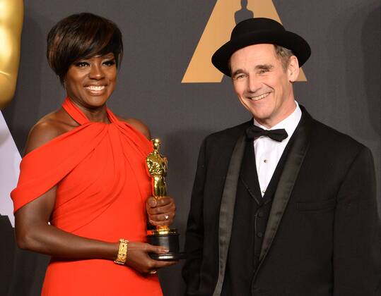 Actress Viola Davis (L), winner of the award for Actress in a Supporting Role for Fences , and presenter Mark Rylance appear backstage during the 89th annual Academy Awards at Loews Hollywood Hotel in the Hollywood section of Los Angeles on February 26, 2017.  LAP20170226922 JIMxRUYMEN