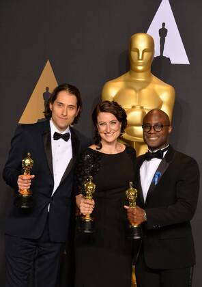 Producer Jeremy Kleiner (L), producer Adele Romanski (C), and writer director Barry Jenkins, winners of the award for Best Picture for Moonlight , appear backstage during the 89th annual Academy Awards at Loews Hollywood Hotel in the Hollywood section of Los Angeles on February 26, 2017.  LAP201702261070 JIMxRUYMEN