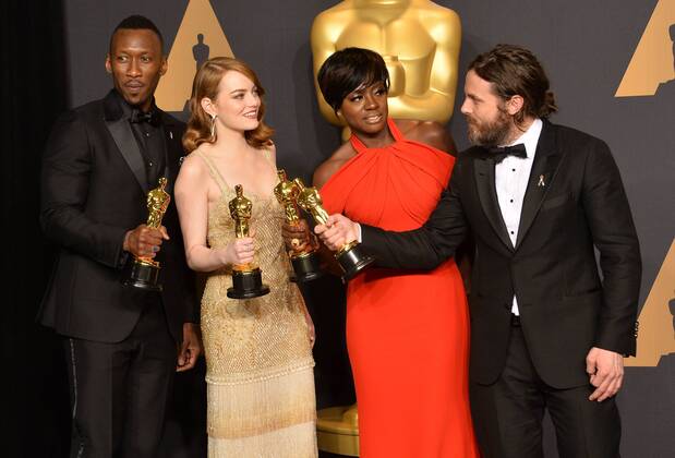 (L-R) Actors Mahersala Ali, winner of the award for Actor in a Supporting Role for Moonlight , Emma Stone, winner of the award for Actress in a Leading Role for La La Land , Viola Davis, winner of the award for Actress in a Supporting Role for Fences , and Casey Affleck, winner of the award for Actor in a Leading Role for Manchester by the Sea appear backstage during the 89th annual Academy Awards at Loews Hollywood Hotel in the Hollywood section of Los Angeles on February 26, 2017.  LAP201702261054 JIMxRUYMEN