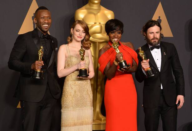 (L-R) Actors Mahersala Ali, winner of the award for Actor in a Supporting Role for Moonlight , Emma Stone, winner of the award for Actress in a Leading Role for La La Land , Viola Davis, winner of the award for Actress in a Supporting Role for Fences , and Casey Affleck, winner of the award for Actor in a Leading Role for Manchester by the Sea appear backstage during the 89th annual Academy Awards at Loews Hollywood Hotel in the Hollywood section of Los Angeles on February 26, 2017.  LAP201702261056 JIMxRUYMEN
