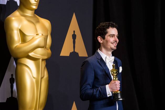 Damien Chazelle poses after winning the Best Director for La La Land at press room of the 89th Academy Awards at the Dolby Theater in Los Angeles, the United States, on Feb. 26, 2017. ) (zxj) U.S.-LOS ANGELES-OSCAR-AWARD YangxLei 