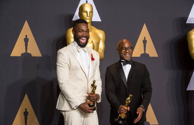 Writer Tarell Alvin McCraney (L) and director Barry Jenkins, winners of Best Picture Moonlight , pose at press room of the 89th Academy Awards at the Dolby Theater in Los Angeles, the United States, on Feb. 26, 2017. ) (zjy) U.S.-LOS ANGELES-OSCAR-AWARD YangxLei 
