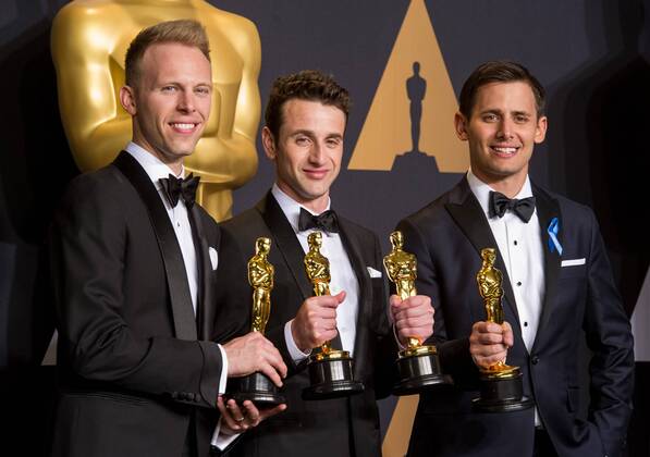 (L-R) Songwriters Justin Paul, Justin Hurwitz and Benj Pasek pose after winning the Best Original Song award for City of Stars from La La Land at press room of the 89th Academy Awards at the Dolby Theater in Los Angeles, the United States, on Feb. 26, 2017. )(zf) U.S.-LOS ANGELES-OSCAR-AWARD YangxLei 