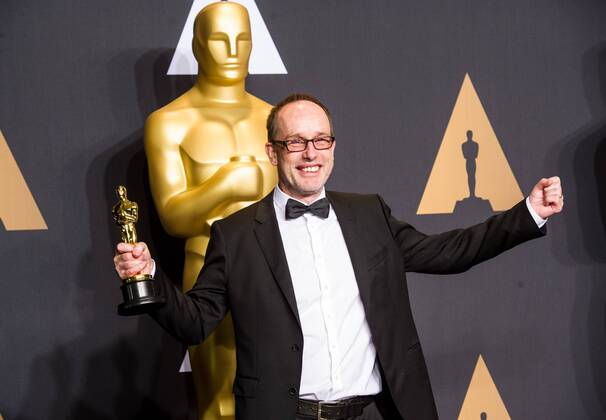 Editor John Gilbert poses after winning the Best Film Editing award for Hacksaw Ridge at press room of the 89th Academy Awards at the Dolby Theater in Los Angeles, the United States, on Feb. 26, 2017. )(zf) U.S.-LOS ANGELES-OSCAR-AWARD YangxLei 