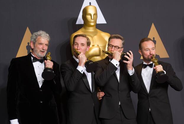 (L-R) Sound mixers Peter Grace, Robert Mackenzie, Kevin O Connell and Andy Wright pose after winning the Best Sound Mixing award for Hacksaw Ridge at press room of the 89th Academy Awards at the Dolby Theater in Los Angeles, the United States, on Feb. 26, 2017. )(zf) U.S.-LOS ANGELES-OSCAR-AWARD YangxLei 