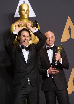 Director Alan Barillaro and producer Marc Sondheimer pose after winning the Best Animated Short Film award for Piper at press room of the 89th Academy Awards at the Dolby Theater in Los Angeles, the United States, on Feb. 26, 2017. )(zf) U.S.-LOS ANGELES-OSCAR-AWARD YangxLei 