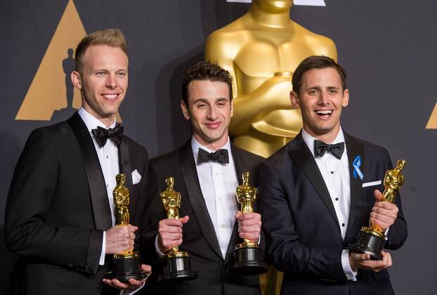(L-R) Songwriters Justin Paul, Justin Hurwitz and Benj Pasek pose after winning the Best Original Song award for City of Stars from La La Land at press room of the 89th Academy Awards at the Dolby Theater in Los Angeles, the United States, on Feb. 26, 2017. )(zf) U.S.-LOS ANGELES-OSCAR-AWARD YangxLei 