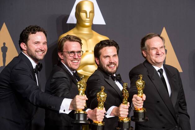 Visual effects artists Dan Lemmon, Andrew R. Jones, Adam Valdez and Robert Legato pose after winning the Best Visual Effects award for The Jungle Book at press room of the 89th Academy Awards at the Dolby Theater in Los Angeles, the United States, on Feb. 26, 2017. )(zf) U.S.-LOS ANGELES-OSCAR-AWARD YangxLei 