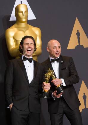 Director Alan Barillaro and producer Marc Sondheimer pose after winning the Best Animated Short Film award for Piper at press room of the 89th Academy Awards at the Dolby Theater in Los Angeles, the United States, on Feb. 26, 2017. )(zf) U.S.-LOS ANGELES-OSCAR-AWARD YangxLei 