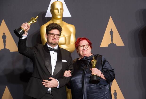 Director Kristof Deak (L) and producer Anna Udvardy pose after winning the Best Live Action Short Film award for Sing at press room of the 89th Academy Awards at the Dolby Theater in Los Angeles, the United States, on Feb. 26, 2017. )(zf) U.S.-LOS ANGELES-OSCAR-AWARD YangxLei 