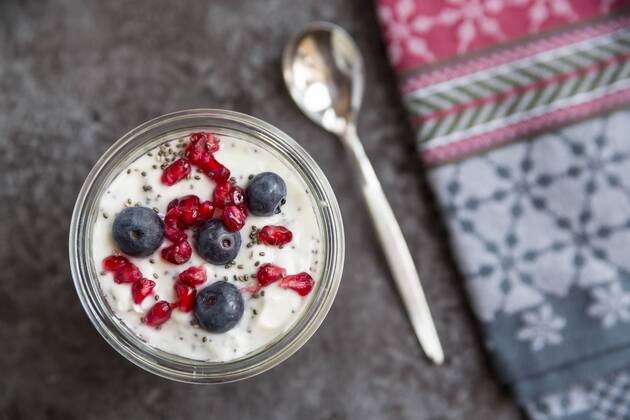 Fresh yogurt with blueberries, pomegranate seeds and chia  SARF03124