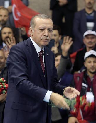 Turkish President Recep Tayyip Erdogan meets with the members of Chamber of Merchants and Craftsmen at Bagcilar city of Istanbul, 19th of March, 2017.  15651939