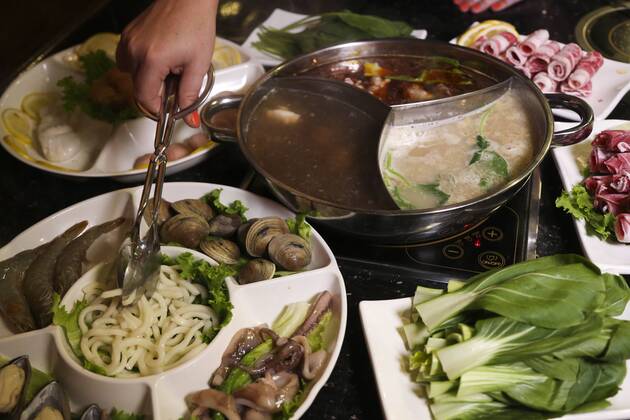 April 12, 2017 - St. Petersburg, Florida, U.S. - EVE EDELHEIT Times.Another option for cooking meat at the restaurant is by Hot Pot which is used to cook the meat, seafood and vegetables in different types of soups and broth at 66 Q-Pot Korean BBQ in Pinellas Park on Wednesday, April 13, 2017. St. Petersburg U.S. - ZUMAs70_ 20170412_zan_s70_026 Copyright: xEvexEdelheitx
