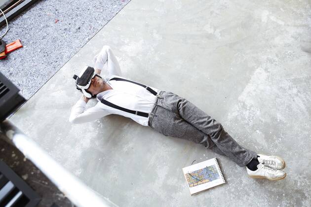 Architect using Virtual Reality Glasses at construction site model released Symbolfoto property released  REAF00260
