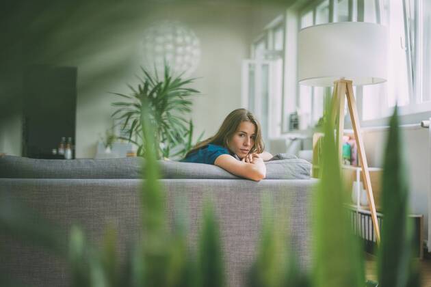 Portrait of young woman relaxing at home model released Symbolfoto property released  KNSF01674