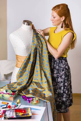 Fashion designer working at mannequin model released Symbolfoto property released  MGIF00051