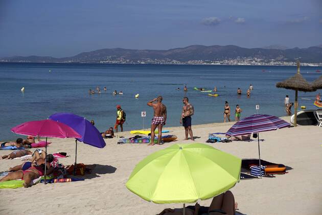 06 09 2017 Spain Island Mallorca at Tourists Hotspot Ballermann in El Arenal lie the Holidaymakers at Sand beach here at Balneario 2 in Arenal 06 09 2017 Mallorca 06 09 2017 Mallorca