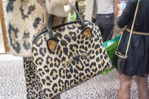 Kate Spade-Man Repeller collaboration in New York Shoppers browse the Kate Spade-Man Repeller leopard themed pop-up shop on trendy Bleecker Street in New York on Friday, September 29, 2017. The collaboration entitled Kate Spade New York X Man Repeller Leopard Leopard Leopard features for three days only, a curated collection of leopard themed products. Cat -Eye make up tutorials and other activities are planned. (  RichardxB.xLevine