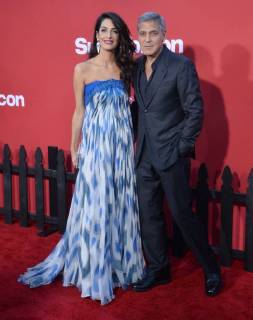 Director producer writer George Clooney and his wife, human rights attorney Amal Clooney attend the premiere of his new motion picture crime thriller Suburbicon at the Regency Village Theatre in the Westwood section of Los Angeles on October 22, 2017. Storyline: Suburbicon is a peaceful, idyllic suburban community with affordable homes and manicured lawnsÉthe perfect place to raise a family, and in the summer of 1959, the Lodge family is doing just that. But the tranquil surface masks a disturbing reality, as husband and father Gardner Lodge (Matt.Damon) must navigate the townÕs dark underbelly of betrayal, deceit, and violence. This is a tale of.very flawed people making very bad choices. This is Suburbicon.  LAP2017102201 JIMxRUYMEN