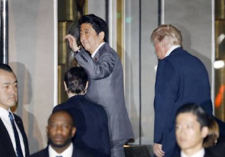 Trump in Japan Japanese Prime Minister Shinzo Abe (C) and U.S. President Donald Trump (R) arrive at Ukai-Tei restaurant in Tokyo s Ginza on Nov. 5, 2017, a day before their formal talks at Abe s office.