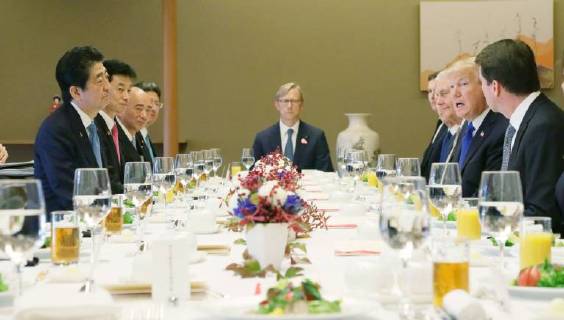 Trump in Japan Japanese Prime Minister Shinzo Abe (L) and U.S. President Donald Trump (2nd from R) attend a working lunch at the State Guest House in Tokyo on Nov. 6, 2017. (Pool Photo)