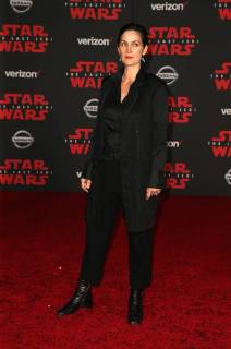 LOS ANGELES, CA - DECEMBER 9: Carrie-Anne Moss, at Premiere Of Disney Pictures And Lucasfilm s Star Wars: The Last Jedi at Shrine Auditorium in Los Angeles, California on December 9, 2017. Copyright: xFayexSadoux