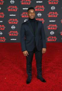 LOS ANGELES, CA - DECEMBER 9: John Boyega, at Premiere Of Disney Pictures And Lucasfilm s Star Wars: The Last Jedi at Shrine Auditorium in Los Angeles, California on December 9, 2017. Copyright: xFayexSadoux