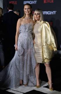 Cast members Lucy Fry (L) and Noomi Rapace attend the premiere of the sci-fi motion picture thriller Bright at the Regency Village Theatre in the Westwood section of Los Angeles on December 13, 2017. Storyline: Set in a world where mystical creatures live side by side with humans. A human cop is forced to work with an Orc to find a weapon everyone is prepared to kill for.  LAP2017121387 JIMxRUYMEN