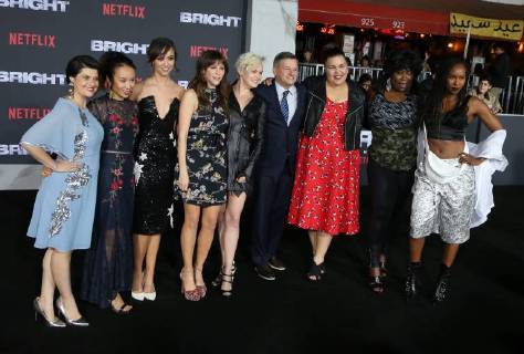 WESTWOOD, CA - DECEMBER 13: Rebekka Johnson, Kia Stevens, Brit Baron, Jackie Tohn, Kimmy Gatewood, Ted Sarandos, Britney Young, at Premiere Of Netflix s Bright at The Regency Village Theatre, In Hollywood, California on December 13, 2017. Copyright: xFayexSadoux