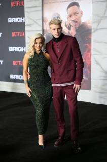 WESTWOOD, CA - DECEMBER 13: Bebe Rexha, Machine Gun Kelly, at Premiere Of Netflix s Bright at The Regency Village Theatre, In Hollywood, California on December 13, 2017. Copyright: xFayexSadoux