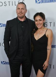 Cast members Christian Bale and Q orianka Kilcher attend the premiere of the motion picture western Hostiles at the Academy of Motion Picture Arts & Sciences in Beverly Hills, California on December 14, 2017. Storyline: In 1892, a legendary Army captain reluctantly agrees to escort a Cheyenne chief and his family through dangerous territory.  LAP2017121401 JIMxRUYMEN