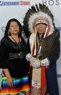 Chief Phillip Whiteman Jr. and his wife Lunette Two Bulls attend the premiere of the motion picture western Hostiles at the Academy of Motion Picture Arts & Sciences in Beverly Hills, California on December 14, 2017. Storyline: In 1892, a legendary Army captain reluctantly agrees to escort a Cheyenne chief and his family through dangerous territory.  LAP2017121417 JIMxRUYMEN
