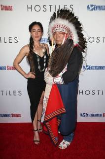 BEVERLY HILLS, CA - DECEMBER 14: Q Orianka Kilvcher, Chief Phillip Whiteman Jr., at Premiere Of Entertainment Studios Motion Pictures Hostiles at Samuel Goldwyn Theater, In Beverly Hills, California on December 14, 2017. Copyright: xFayexSadoux