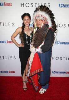BEVERLY HILLS, CA - DECEMBER 14: Q Orianka Kilvcher, Chief Phillip Whiteman Jr., at Premiere Of Entertainment Studios Motion Pictures Hostiles at Samuel Goldwyn Theater, In Beverly Hills, California on December 14, 2017. Copyright: xFayexSadoux