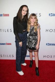 Ava Cooper and her sister Stella Cooper at the Hostiles Film Premiere on 14 12 2017 at Beverly Hills Los Angeles Hostiles Film Premiere in Los Angeles 2017