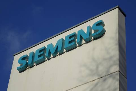 07 12 2017 Tiergarten Berlin Moabit Huttenstrasse signature gas turbine plant of Siemens Siemens group Siemens AG technology group Berlin gas turbine plant gas turbines turbine gas power generation energy power generation power Schtiftzug tree shadow