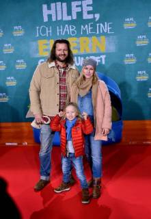 The pregnant actress of Dorkas Kiefer with partner Sascha Hauck and son Sam posing on 14 01 2018 in Cologne at the premiere of the movie help I my parents shrunk 01 in German cinemas coming on 18
