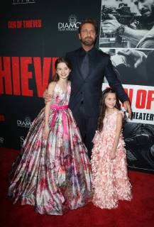 LOS ANGELES, CA - JANUARY 17: Gerard Butler, Elle Whitfield, Madelyn Lazar, at the premiere of Den Of Thieves at Regal Theaters at LA Live in Los Angeles, California on January 17, 2018. Copyright: xFayexSadoux