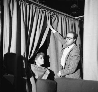 Theatre and film director Peter Brook at Elstree Studios in 1955 during production of Heaven and Earth, a made for TV drama co scripted by Brook and Denis Cannan and based on Jonah and the Whale. The actress is Dorothy Bromiley and the male lead was Paul Scofield., United Kingdom England Copyright: Topfoto  UnitedArchives1373165