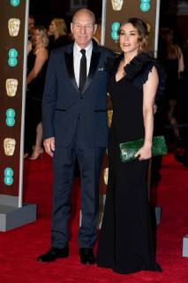 February 18, 2018 - London, London, UK - SIR PATRICK STEWART and SUNNY OZELL arrives on the red carpet for the EE British Academy Film Awards 2018, held at the Royal Albert Hall, London, UK. London UK  - ZUMAl94_ 20180218_zaf_l94_073 Copyright: xRayxTangx