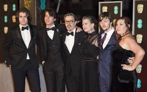 EE British Academy Film Awards (BAFTA) London, UK. Gary Oldman and family at the EE British Academy Film Awards (BAFTA) held at Royal Albert Hall on February 18, 2018 in London 18th February 2018. LMK386-S1156-180218 