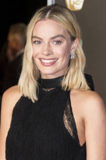 February 18, 2018 - London, London, UK - Margot Robbie arrives on the red carpet for the EE British Academy Film Awards 2018, held at the Royal Albert Hall. London UK  - ZUMAt138 20180218_zap_t138_036 Copyright: xRayxTangx
