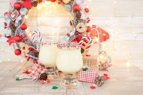Eggnog with candy cane with colourful decoration for Christmas egg Nog with candy canes  1079704645