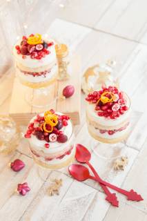 Dessert in layers with white chocolate mousse Orange and pomegranate Christmas trifle  1079704696