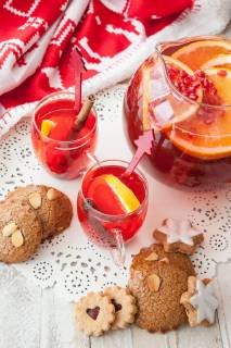 Hot punch with pomegranate and orange cinnamon hot fruit punch  1079704715