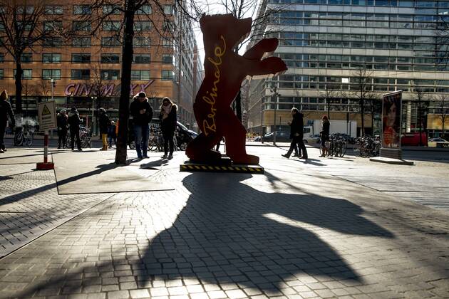 A Berlinale advertising Baer casts shadows near the Sony Center in Berlin on 23 February 2018