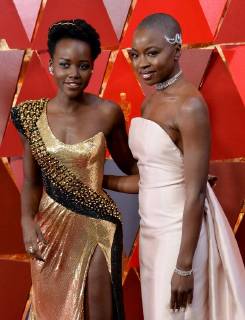 Actors Lupita Nyong o (L) and Danai Gurira arrive on the red carpet for the 90th annual Academy Awards at the Dolby Theatre in the Hollywood section of Los Angeles on March 4, 2018.  LAP20180304395 JIMxRUYMEN