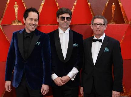 Production designer Paul Denham Austerberry (L) and set decorators Shane Vieau (C) and Jeffrey A. Melvin arrive on the red carpet for the 90th annual Academy Awards at the Dolby Theatre in the Hollywood section of Los Angeles on March 4, 2018.  LAP20180304495 JIMxRUYMEN